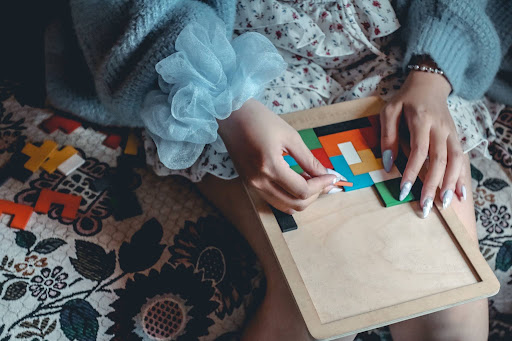 Adult participating in brain training exercises to improve memory and cognitive skills